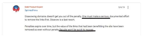 Google Product Expert forum reply explaining that disavowing domains will not lift a penalty