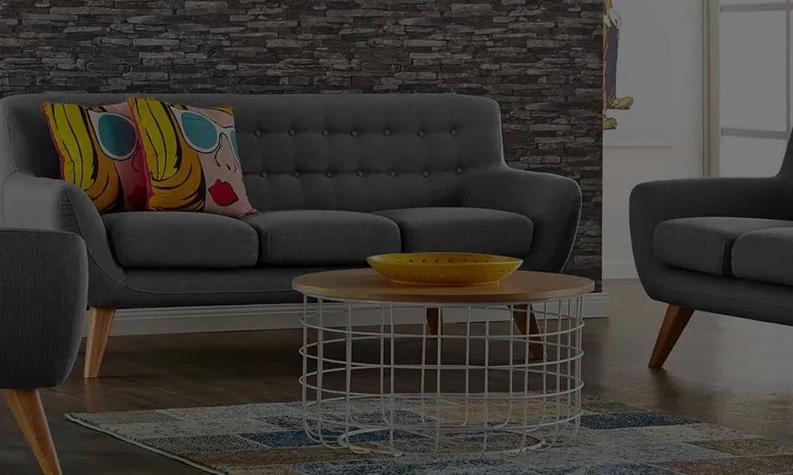 A lounge suite and armchairs from Monster Furniture