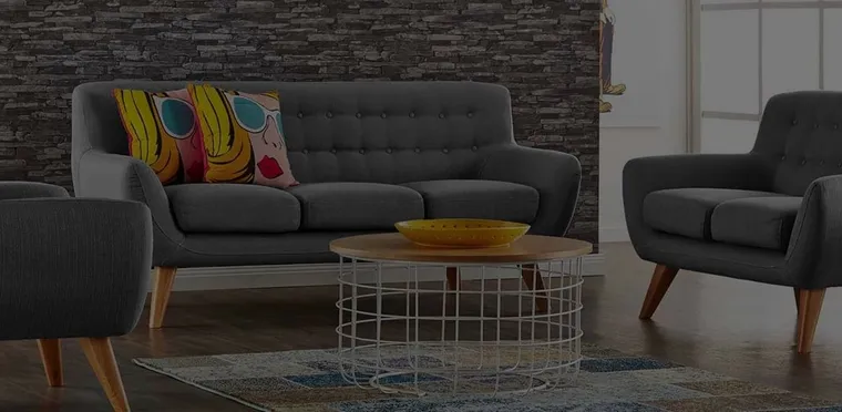 A lounge suite and armchairs from Monster Furniture