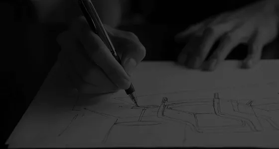 A designer sketching a furniture design at Hudson Furniture