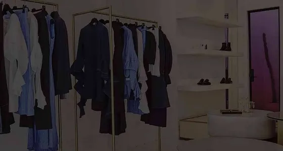 Garment racks in an Ellery fashion showroom