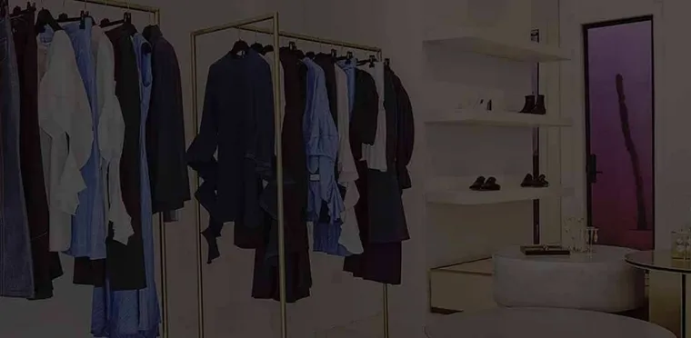 Garment racks in an Ellery fashion showroom