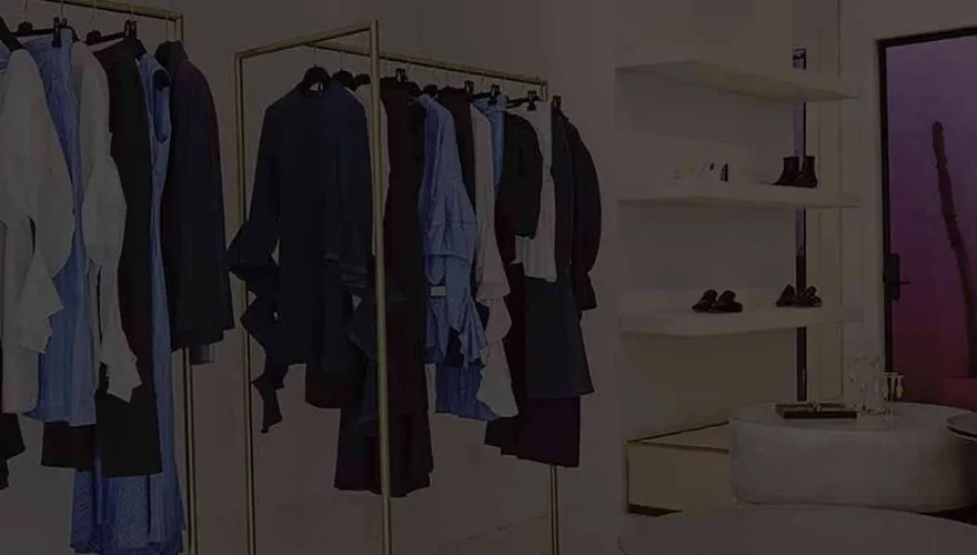 Garment racks in an Ellery fashion showroom