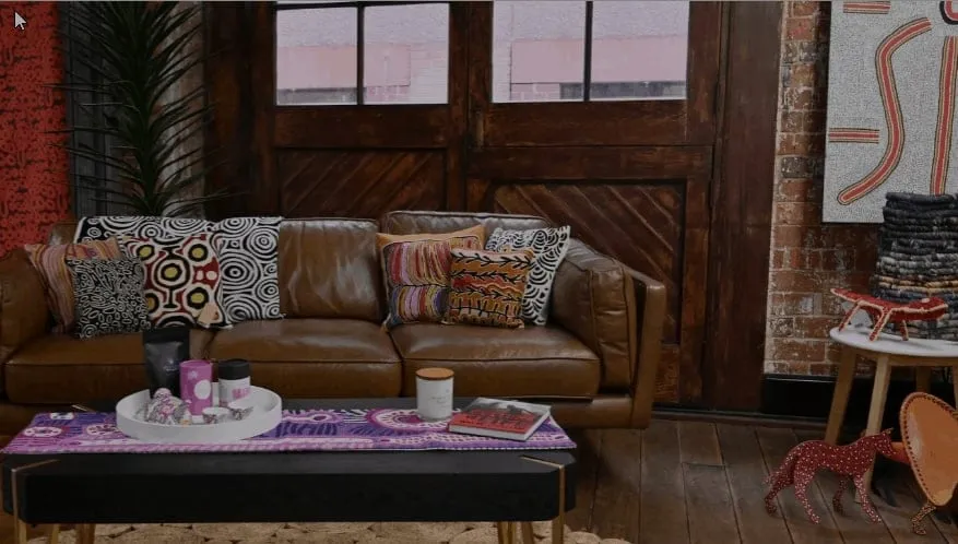 A living room styled with Aboriginal art and homewares from Welcome to Country