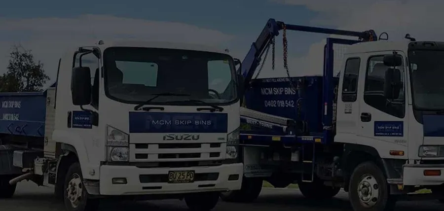 Two MCM Skip Bins trucks loaded with skips