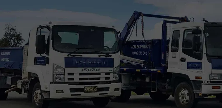 Two MCM Skip Bins trucks loaded with skips