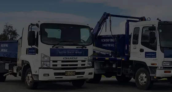 Two MCM Skip Bins trucks loaded with skips