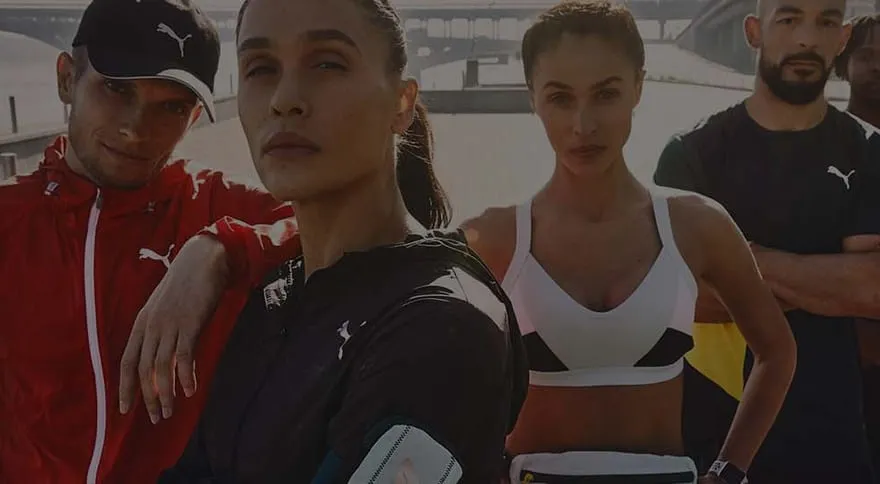 A group of athletes in training gear, from IN SPORT