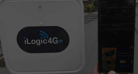 An iLogic4G monitoring unit installed beside a smartphone readout
