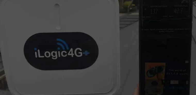 An iLogic4G monitoring unit installed beside a smartphone readout