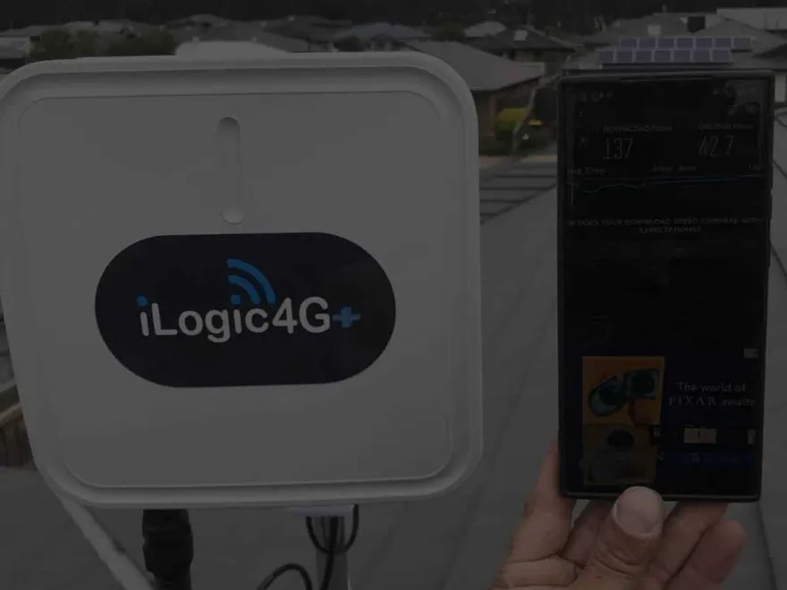 An iLogic4G monitoring unit installed beside a smartphone readout