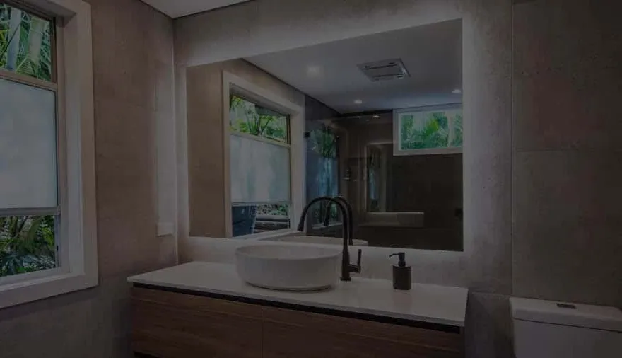 A bathroom fitted with Clearlight Designs window furnishings