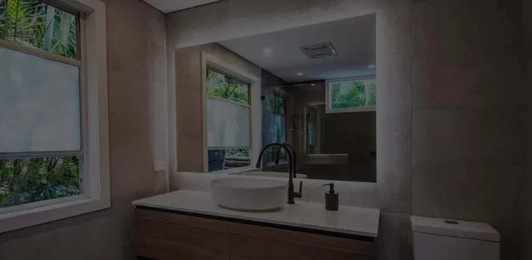 A bathroom fitted with Clearlight Designs window furnishings