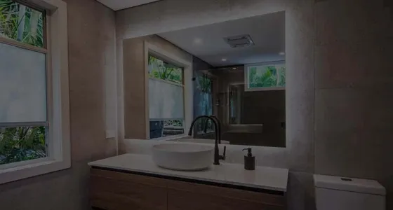 A bathroom fitted with Clearlight Designs window furnishings